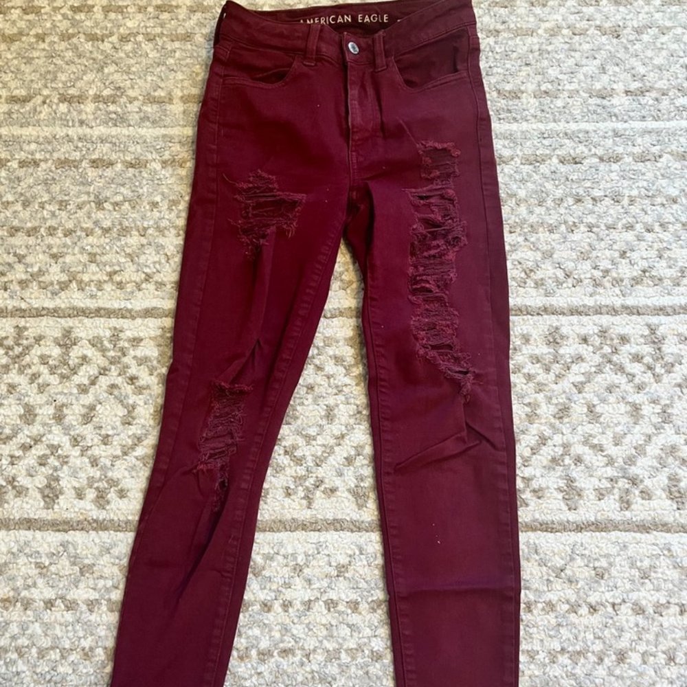 American Eagle size 2 maroon ripped skinny jeans